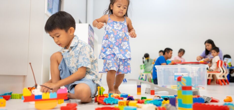 Adorable,preschool,asian,kid,boy,and,girl,enjoying,play,colorful