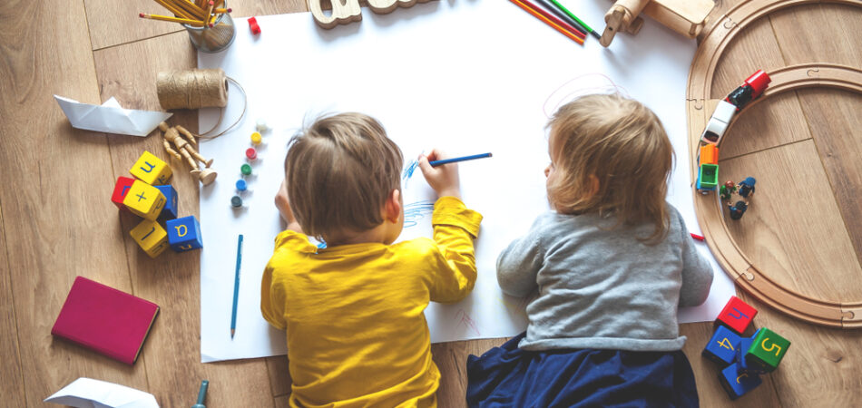 Kids,drawing,on,floor,on,paper.,preschool,boy,and,girl