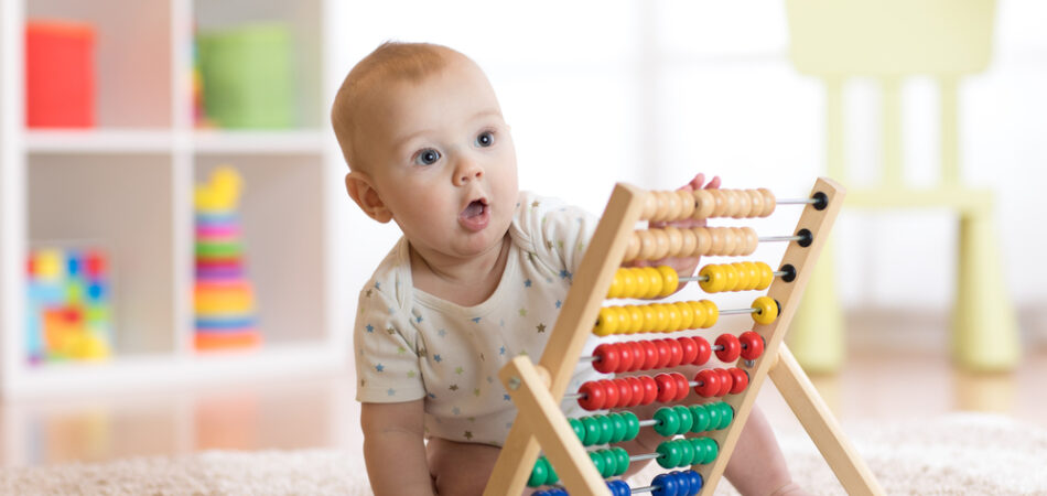 Child,boy,playing,with,abacus,in,kindergarten,or,home