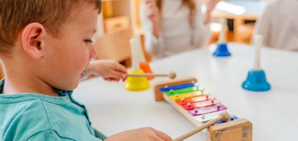 Kindergarten,children,learning,music,using,various,colorful,instruments.,learning,music